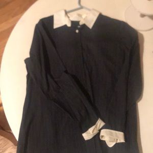 Sweet baby doll dress or shirt worn with tights. Zipper is super cute